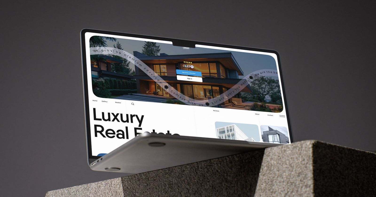 Luxury real estate website design displayed on a laptop